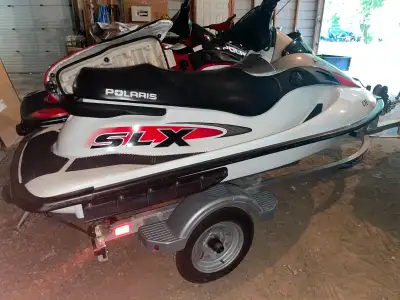 Low Hour, ski with new battery and single trailer. good running unit.
