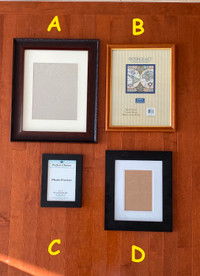 Moving sale:4 photo frames of various sizes,brand new condition!