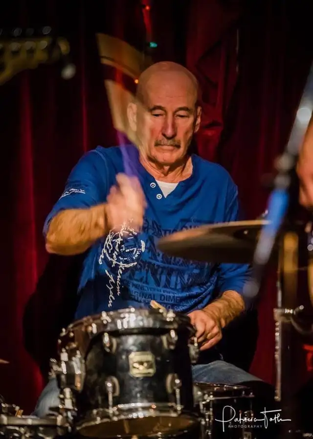 Mature  drummer looking
