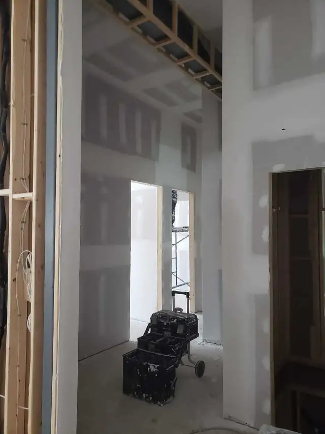 Drywall and Tapping 65561332681603122