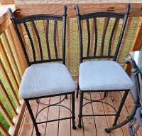 2 rot iron chairs