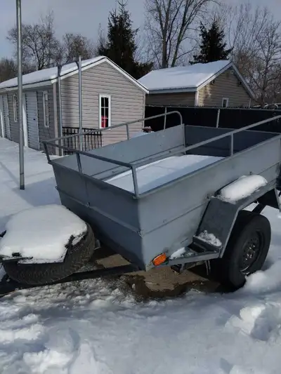 This is a utility trailer perfect for hauling items. As you can see in the photos it has been used....