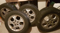 205 55R16 all seasons tires on alloy rims for sales.