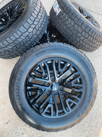 G105. 2023 Chevy Silverado\Tahoe black rims Cooper AT3 tires