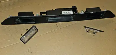 Audi Lift-Gate Finish Panel - License plate lights used in good working condition 2005-2013 Audi par...