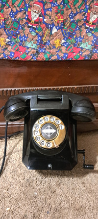 Antique 40s wall phone, new clothe cords,works perfectly.