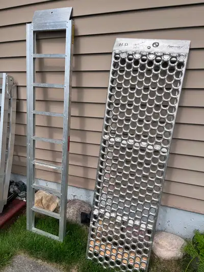 I have a dirt bike and a heavy duty for Harley weight ramp for sale. Both very good for their intend...