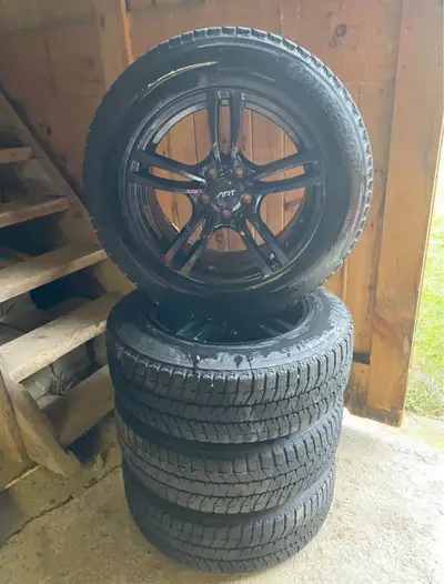 Winter tires and rims for sale. Bridgestone Blizzak ws90 on ART rims. Used for one season, pretty we...
