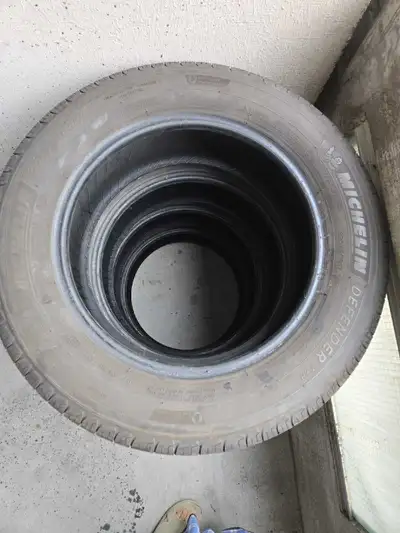 I am selling a set of four Michelin Defender all-season tires, size 225/60R17 99H. These tires are u...