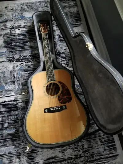 This one-of-kind guitar is from a private collection. A very rare offer. Back and sides are made of...