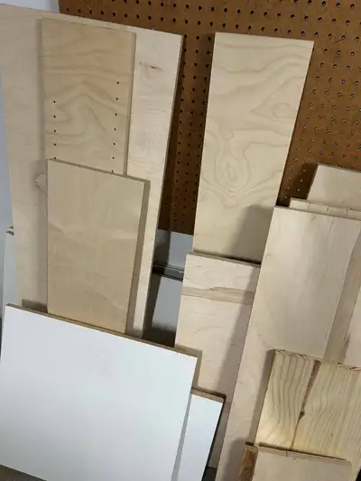 Assorted lumber: plywood, 2x2, 2x4, 4x4, particle board, View more