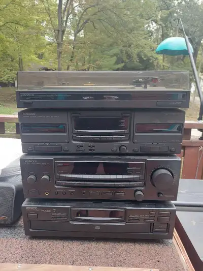 Remote/ manuals and speaker wire Front and centre speakers are not Kenwood has RCA inputs for surrou...