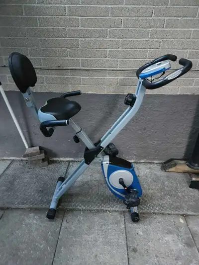 This stationary bike is great for home workouts. It's a foldable design, making it easy to store.