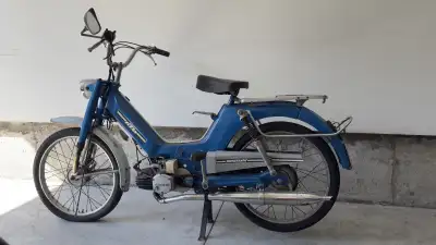 I'm selling a vintage KTM moped in used condition, featuring a charming blue finish and classic desi...
