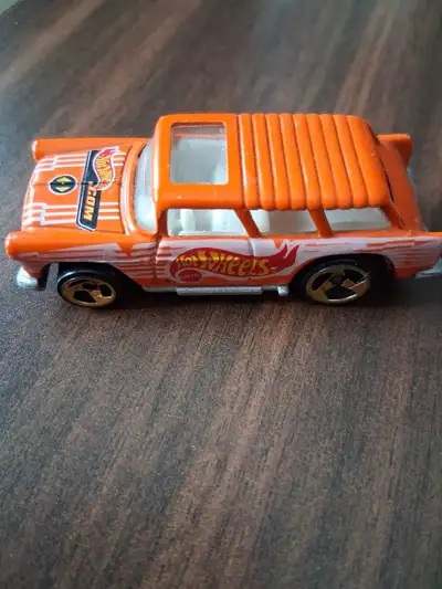 This orange Hot Wheels Chevy Nomad die-cast car is ready to roll into your collection! This used toy...