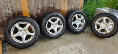 4 - GT RADIAL WINTER TRIES + RIMS - 235/65/R17. Lots of threads left. Very good condition Were on a...