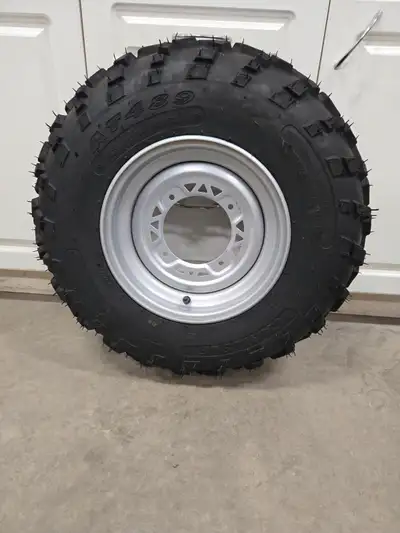 Two Tires/Rims. Like new. 25 X 8.00 - 12.