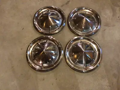 Full disk chrome hub caps…. 3.. very good ..1 a few small dents around outer rim