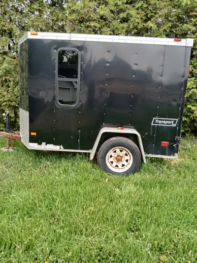 Great trailer with windows on both sides. Wiring needs some work for rear lights, wiring underneath...