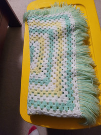 Crocheted baby blanket.