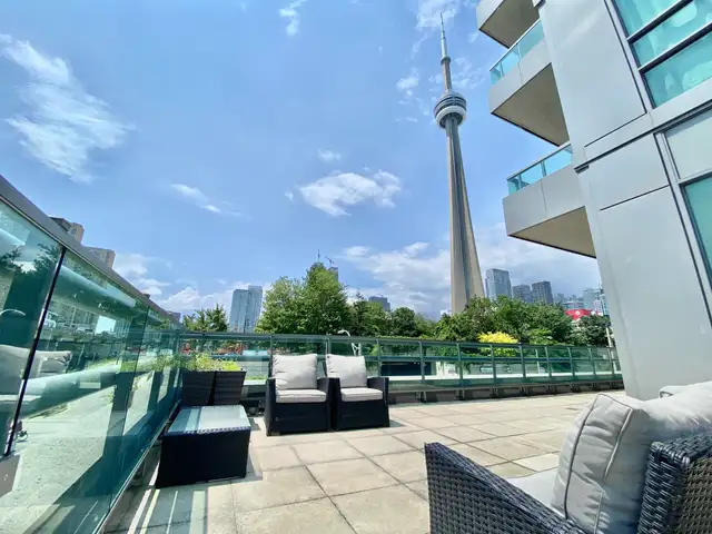 Sought-after Corner w/ Massive Wraparound Terrace | 2 Bed + Den in Long Term Rentals in City of Toronto - Image 2