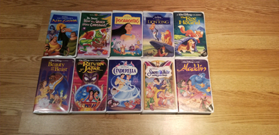 -10 Disney movies. - good condition. - see image for movie titles. - from a smoke-free/pet-free and...
