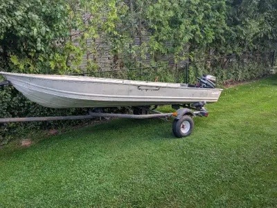 14' SEA NYMPH ALUMINUM BOAT WITH 6HP YAMAHA AND TRAILER. $2000 OBO
