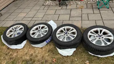 Selling a full set of four BRAND NEW Nokian One 235/55R17 all‑season tires, already mounted and bala...