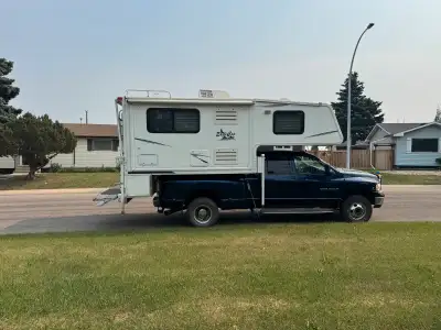 2008 Eagle Cap 990 Truck Camper. One owner, Pantry fridge and dinette slide out to make a lot of ext...