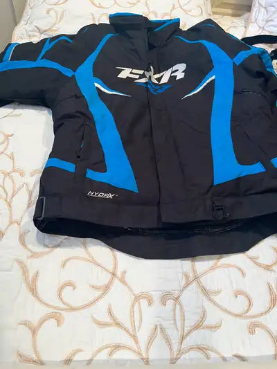 Ladies Team Snowbile Jacket and Pant. Only used 5 times. New condition. Jacket is size 12 and pant i...