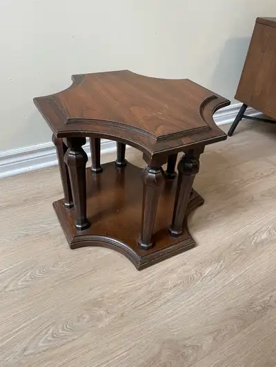 A charming solid‑walnut side table made in Canada, featuring gorgeous grain, warm tone, and classic...