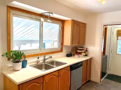Bright and spacious 3 bedroom main floor unit
