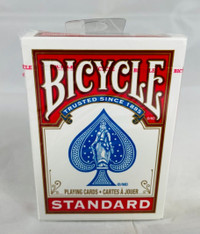 Playing cards and full  decks of 52 cards in packs.