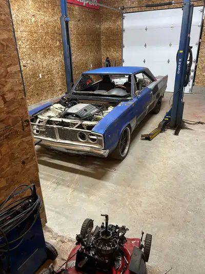 This is a coronet body on a Chrysler 300 chassis, 5.7 Hemi, two sets of rims, starts runs and drives...