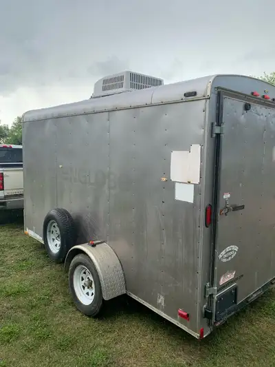 12 ft fully insulated trailer is set up for either heated or air conditioning cooling Fits a quad pl...
