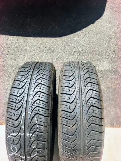 2x Four Season Pirelli tires on rims. P 185/60 R15 84T M+S. Bolt pattern 4X100 Less 5k on them!