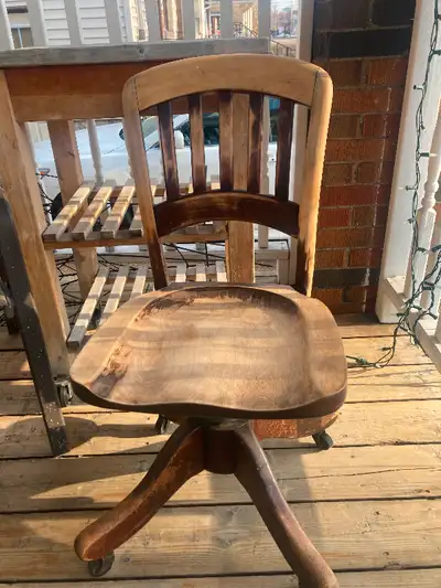 Antique desk chair, can still do with more renovation to restore the beautiful old wood.