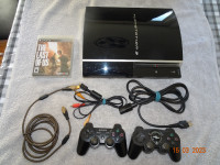 Console PS3 (1ère génération) + jeu PS3 The last of us (neuf)