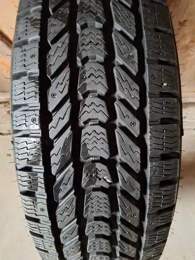 Like brand new 265 70 18 ten ply winterforce tires on rims 6 bolt gmc bolt pattern 6x6.5 with studs....