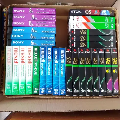 100 VHS Tapes with 2 Drawers in Excellent Condition, View more