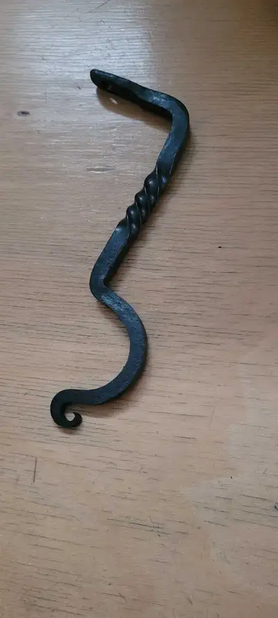 Functional artisan hand forged metal hook is a beautiful crafted blacksmith's piece. It has a twiste...