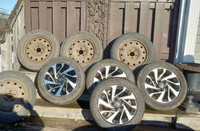 Winter and summer tires on rims.Excellant new shape