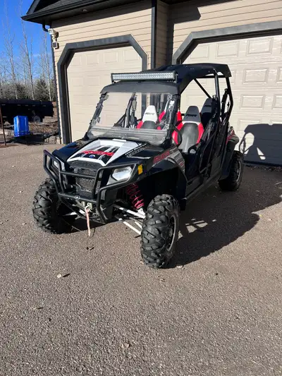 2013 800 rzr 4 seater low miles in great condition has front winch and light bar. Open to reasonable...