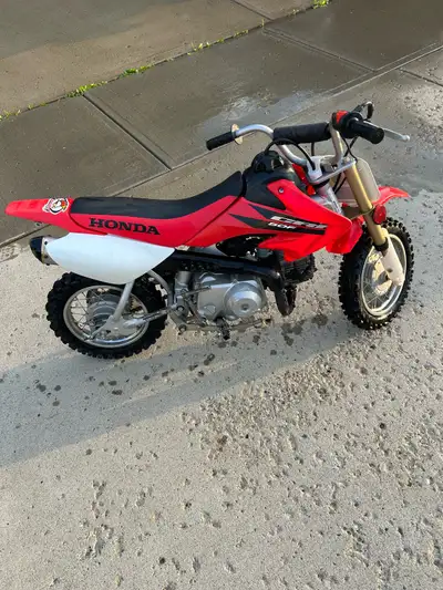 Honda CRF50F 50cc dirt bike Great little bike for kids/ beginners or just messing around with •50cc...