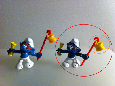 This ads shows 2 variants of Carnival Smurf and is offering the one circled in RED. Excellent condit...