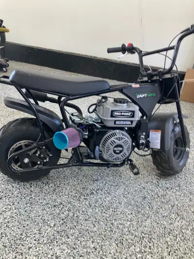 Mini bike with 6.5hp electric start. This bike is 100% complete and ready to ride. The engine is bra...