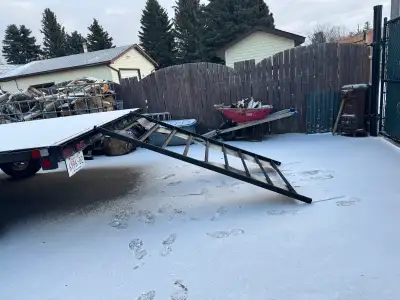 Flat deck trailer is 17 feet long and a bit over 8 feet wide - rear pull out Ramp is 4 feet wide. -B...