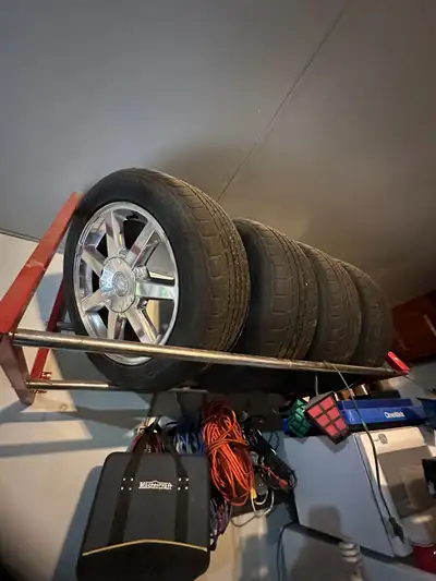 Tires and Rims from a 2005 Cadillac Sts chrome rims 225/55/R17 Rims are in good condition besides a...