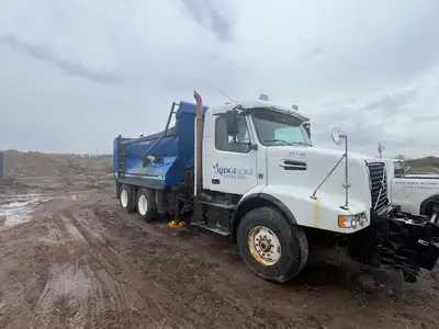 2010 Volvo VHD Tandem Dump Truck for sale. D13 Engine 201210 km Viking Cives Proline salter body wit...