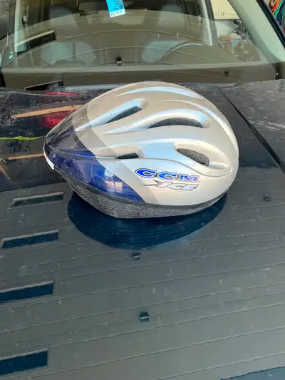 CCM Ice Bike Helmet New – never used Universal sizing Grey / Blue Color Ad will be removed once sold...